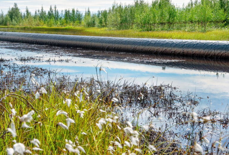 The rush of an oil pipeline. Oil spill..Pollution of the environment.