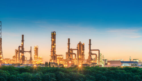 Landscape of Oil Refinery Plant and Manufacturing Petrochemical at Twilight Sunset Scenic View, Industry of Power Energy and Chemical Petroleum Product Factory. Building of Chemical Production Line