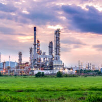 Oil and gas industry - refinery at sunset - factory - petrochemical plant