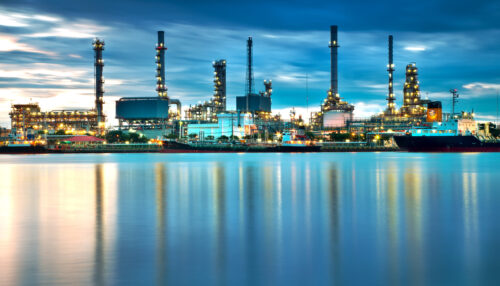 Oil refinery with reflection, petrochemical plant