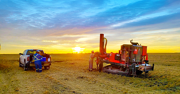 oil rig drilling in Alberta field