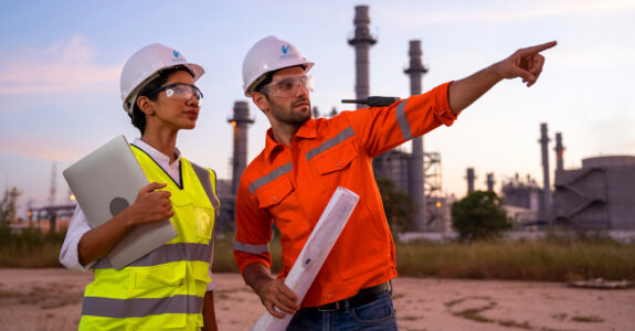 Two,Engineers,Working,With,Laptop,At,Front,Oil,And,Gas Two engineers working with laptop at front oil and gas refinery plant industry factory.
occupation,caucasian,fuel,laptop,professional,horizontal,safety,